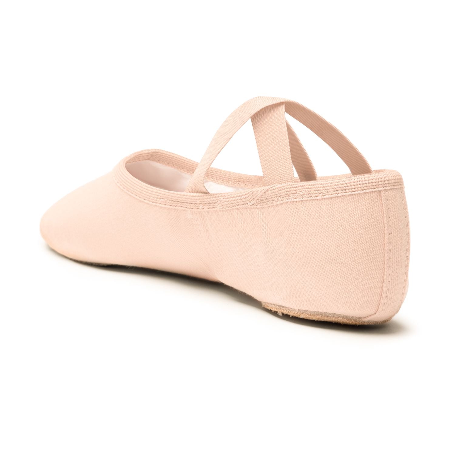 Eine Seitenansicht des rosa Ballettschläppchens Rumpf SD16 Só Dança mit elastischen Trägern, hergestellt aus Leinen-Stretch-Material.